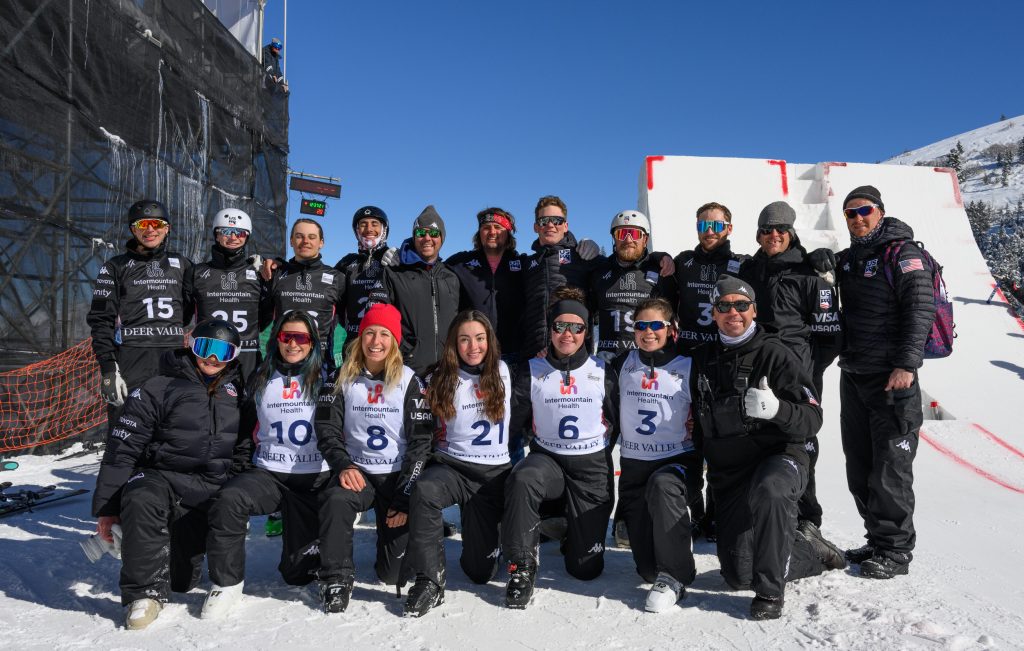 A group picture of the USA aerials team after an event.